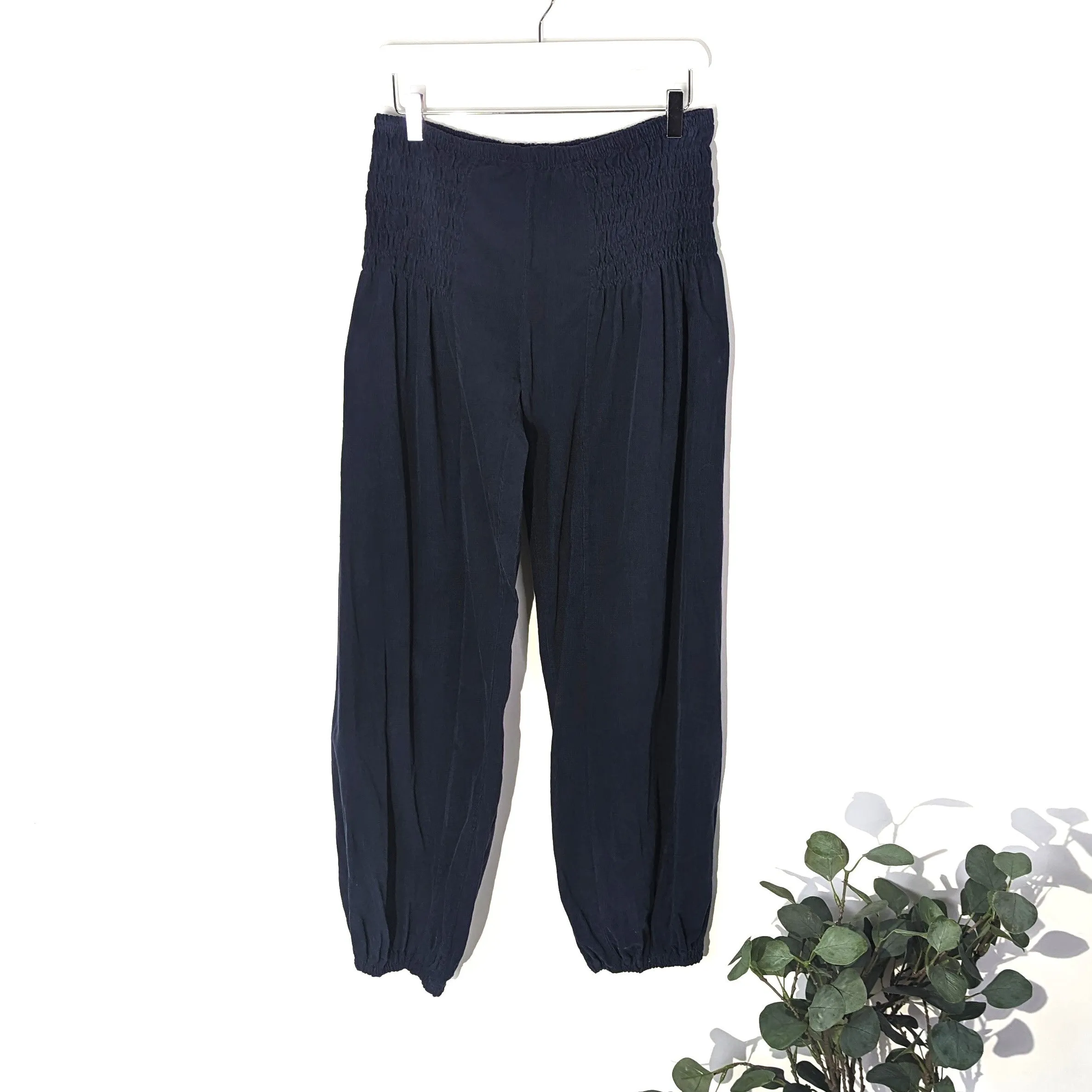 Fine corduroy balloon style trousers with deep elasticated waist band (M)